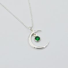 Are you looking for the perfect gift idea for your mother, sister, daughter, girlfriend or wife? We present to you a necklace with a moon and a synthetic emerald, saphire, ruby or zirkon. It's the perfect gift for any occasion, such as birthdays, Confirmation, First Holy Communion, wedding anniversary and many more! ❤️ Each product purchased in our store is packed in a decorative box for FREE! 🎁 ❗️ All our products are made of the highest quality 925 silver. ❗️ 🏷️ Handmade jewelry 🏷️ The prod Silver May Birthstone Necklace For Mom, Silver May Birthstone Necklace As Gift For Mom, Silver Round Pendant Jewelry For Mom, Silver Emerald Necklace In Sterling Silver, Elegant Moon Charm Jewelry As A Gift, Silver Jewelry With Moon Charm For Gift, Elegant Jewelry With Moon Charm For Gift, Sterling Silver Pendant Jewelry Gift, Sterling Silver Pendant Jewelry As Gift