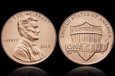 an american one cent coin on a black background