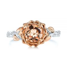 103524 14k White Gold & Rose Gold Ring   20 Diamonds - .09 ctw   Clarity: VS2 - Color: F-G   Joseph Jewelry. This gorgeous engagement ring features a round morganite prong set in rose gold in the center of a rose gold flower, accented by rose gold leaves and bright cut set diamond accents on the floral white gold shank below. It was created for a client from Auburn, WA, who reached out to us online after finding a ring he wanted to customize. Design Your Own Engagement Ring      We shared severa Anniversary Rose Gold Flower Ring With Brilliant Cut, Anniversary Rose Gold Sapphire Ring With Diamond Cut, Anniversary Sapphire Ring In Rose Gold With Diamond Cut, Rose Gold Round Cut Flower Ring For Anniversary, Rose Gold Flower Ring For Anniversary, Anniversary Rose Gold Flower Ring Round Cut, Anniversary Rose Gold Topaz Ring With Prong Setting, Rose Gold Flower Ring With Prong Setting, Rose Gold Topaz Ring With Brilliant Cut Diamond