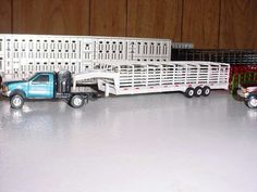 several toy trucks are lined up next to each other