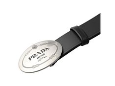 This classic Prada belt features a matte silver oval buckle with Prada Milano logo engraved. Constructed with saffiano cross-grain leather, this belt is practical for everyday wear.       Model: 2CM046    Blue Saffiano Leather  Brushed matte silver oval buckle  Size: 95/38    Height: 1.75  Includes Prada dust bag and authenticity cards  Made in Italy Modern Business Belt Buckles With Logo Plaque, Leather Belt Buckles With Logo Plaque, Modern Business Belt Buckle With Logo Plaque, Modern Leather Belt Buckle With Logo Plaque, Modern Leather Belt Buckles With Logo Plaque, Modern Business Belt Buckles With Metal Logo, Leather Belt Buckles With Logo Plaque For Business, Leather Belt Buckle With Logo For Business, Leather Belt Buckles With Logo For Business