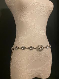 High quality metal rhinestone jewel belt.  Perfect to complete a range of outfits and will make a gorgeous gift.  Wide Range of sizes. Custom made sizes. Bespoke sizes available, leave a note of your waist size with your order. Elegant Chain Belt For Gift, Elegant Silver Belt With Rhinestones, Luxury Silver Metal Chain Belt, Elegant Silver Crystal Chain Belt, Luxury Silver Belt With Rhinestones, Silver Bling Belts For Party, Luxury Silver Chain Belt For Formal Occasions, Luxury Silver Chain Belt For Formal Wear, Elegant Evening Belts With Rhinestones