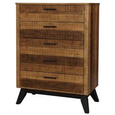 a brown chest of drawers sitting on top of a wooden floor