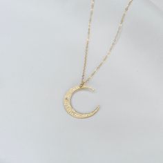 14K solid gold moon necklace - Hammered moon necklace 14K solid gold moon charm is 22 gauge, it is 20mm. 14K gold 1.2mm flat cable chain All components are 14k gold Please read our policies before you place your order. https://www.etsy.com/shop/SashJewelry/policy?ref=shopinfo_policies_leftnav To see other Mother daughter set click here: https://www.etsy.com/shop/SashJewelry?section_id=12441134&ref=shopsection_leftnav_1 To see more Girl's jewelry click on the link below http://www.etsy.com/sh Minimalist Gold-plated Necklace With Moon Charm, Moon-shaped Yellow Gold Necklaces With Charms, 14k Gold-filled Yellow Gold Necklace With Moon Charm, Yellow Gold Moon-shaped Necklaces With Charms, Gold Moon-shaped Necklace With Moon Charm, Other Mother, Gold Heart Bracelet, Gold Moon Necklace, Gold Moon