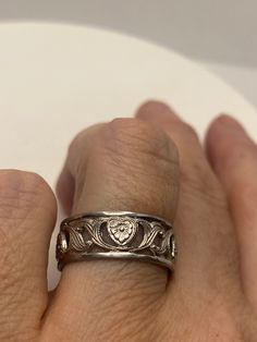 Vintage Wedding band or thumb ring. Size 8 925 Sterling Silver Tarnished with age 925 Sterling Filigree Setting Handmade Can be resized, my jeweler charges $10-$20 All rings are shipped free in the US in a nice gift box. Check out our over a THOUSAND great reviews!!! Engraving is $4 per letter and is not always perfect depending on the piece. It can take a few days if the jeweler is busy. This is payable to Paypal Judithsltd@gmail.com Symbolic Formal Jewelry With Etched Details, Symbolic Wedding Jewelry With Intricate Design, Formal Symbolic Etched Jewelry, Antique Sterling Silver Promise Jewelry, Antique Sterling Silver Jewelry For Promises, Sterling Silver Open Band Engraved Ring Gift, Silver Open Band Promise Jewelry, Etched Promise Ring Jewelry, Symbolic Etched Jewelry For Promise