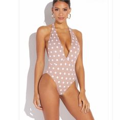 We're Bringing Back The Polka Dot Print! Snag This Super Sexy, Tan Polka Dot One-Piece Today! It's A Halter Neck Swimsuit With A Plunging V-Neck, A Backless Design, & High-Cut, Cheeky Bottoms! 85% Nylon, 15% Spandex Model Wearing Size Small Color: Tan/Taupe, White Polka Dot Print Self-Tie, Halter Neck Plunging V-Neck Not Padded Backless Design High-Cut, Cheeky Bottoms Size: Medium B: 35-36.5" W: 28-29" H: 38-39" Brand New, Price Firm, Bundle For A Better Savings. Boho Business, Business Trendy, Polka Dot One Piece, Halter Neck Swimsuit, Bathing Suits One Piece, Birthday Travel, Yellow Swimsuits, Bandeau One Piece Swimsuit, Floral One Piece Swimsuit