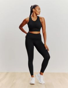 When you want it all, this smooth racerback style is what you need. This sports bra doubles as a workout top so you can effortlessly transition from the gym to the rest of your day. Sewn-in padding and stretchy fabric gives you medium support, seamless feel and none of the shifting. It’s all-around comfort plus a peek of cool mesh. And the secret to the extra pep in your step. | Knix Momenta Racerback Sports Bra in Black Athletic Fit Activewear With Built-in Bra For Training, Versatile 4-way Stretch Racerback Sports Bra, Sporty Racerback Activewear With Built-in Padding, Racerback Sports Bra With Built-in Bra For Pilates, Seamless Racerback Activewear With 4-way Stretch, Athletic Fit Sports Bra For Pilates, Sporty Activewear With Built-in Bra And Athletic Fit, Stretch Racerback Athleisure Activewear, Racerback Stretch Activewear In Athleisure Style