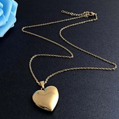 The heart symbol is widely recognized not only as a symbol of love but of compassion, joy, and charity. available in silver, gold, and rose gold chain length: 18-20 inches, adjustable pendant length: one inch * free of lead, nickel, and cadmium Heart Locket Necklace Silver, Bridal Jewellery Inspiration, Gold Locket Necklace, Heart Locket Necklace, Locket Pendant Necklace, Heart Symbol, Heart Shaped Necklace, Rose Gold Chain, Heart Locket