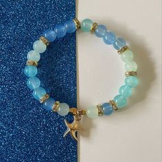 cute beachy bracelet! Beachy Bracelets Beads, Bohemian Blue Jewelry With Starfish Charm, Bohemian Blue Starfish Charm Jewelry, Adjustable Blue Jewelry With Starfish Charm, Adjustable Blue Starfish Jewelry, Colorful Beaded Starfish Bracelets For Beach, Colorful Starfish Beaded Bracelets For Beach, Colorful Beads Starfish Bracelet For Beach, Starfish Shaped Beaded Bracelets For Beach