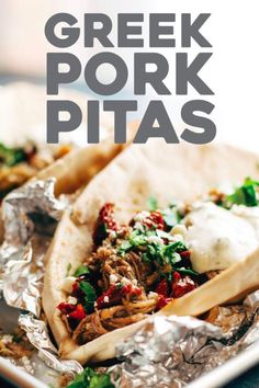 there is a plate with some tacos on it and the words greek pork pitas