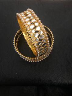 It's time you level up your jewelry box! Add in some bling to with our royal handmade kundan bangles! Style with love and care! We put in so much effort in what we do,because we do it for YOU❤️ Made to order and shipping time 4-6 weeks Can be make as a pair or single too. Each bangle price : $20 Hyderabadi Jewelry, Braid Accessories, Jewelry Kundan, Indian Bangles, Jewelry Pakistani, Kundan Bangles, Kundan Jewelry, Bangles Indian, Small Intimate Wedding