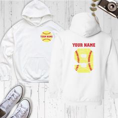 two personalized hoodies and sneakers on a white wooden background with an old camera