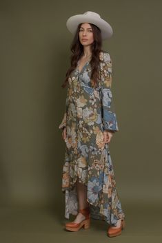 Brand: Promesa Long sleeve button front floral maxi dress with high low hem. ♡ Details Color: Smoke Green Working button front High low hem Partially lined 100% Rayon Hand wash recommended Size & Fit Model info: Height 5'3"| Bust 32"| Waist 25"| Hips 34" Model is wearing a size small Fit: Relaxed fit Stretch: No stretch Measurements: S: Bust 35" | Length 54" M: Bust 37" | Length 55" L: Bust 39" | Length 55" Garden Dress, Long Sleeve Maxi, High Low Hem, Floral Maxi, Long Sleeve Maxi Dress, Floral Maxi Dress, High & Low, High Low, Fitness Models