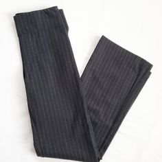 Professional, Yet Comfortable Gray Pinstripe Stretch Trousers By Max Studio. Slim Fit, High Rise, Flared Leg, Fully Elastic, Think Waistband, Back Seam Along Leg. Waist- 14" Unstretched Rise- 10" Inseam- 31" Striped Wide Leg Stretch Pants, Striped Stretch Wide Leg Pants, Striped Stretch Wide Leg Bottoms, High Waist Bottoms With Vertical Stripes For Business Casual, High Waist Vertical Stripes Bottoms For Business Casual, Fitted Wide Leg Pants With Vertical Stripes, Fitted Striped Straight Leg Dress Pants, Fitted Pinstripe High Waist Bottoms, Fitted Dress Pants With Vertical Stripes