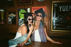 two women dressed up as pirates pose for a photo