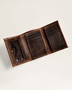 This trifold wallet features a snap closure, ID window, coin pocket, and multiple card slots, providing ample space for all your essentials. With the added protection of RFID technology, your personal information stays safe and secure. Made with Pendleton USA wool in a unique pattern and finished with leather trim, each wallet is one-of-a-kind. Please note that pattern placement may vary. Loving the Pasco Design? Check out the additional matching bags. Pasco Trifold Wallet: Size Closed: 3"W x 4 1/2;"H x 1/2" 100% pure virgin wool; cotton trim Wool fabric woven in Pendletons American mills. Care: Spot clean. No sales tax. Check out our Facebook Photos and Instagram to find fun and inspirational ideas for decorating any space. Vintage Trifold Wallet With Coin Pocket For Travel, Vintage Trifold Wallet With Coin Pocket, Vintage Trifold Wallet With Rfid Blocking For Travel, Trifold Wallet With Interior Card Slots For Travel, Brown Trifold Wallet With Interior Card Slots For Travel, Brown Trifold Wallet With Card Slots For Travel, Vintage Trifold Wallet With Rfid Blocking For Daily Use, Brown Trifold Wallet With Coin Pocket For Travel, Vintage Leather Trifold Wallet With Coin Pocket