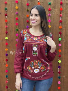 This Beautiful Hand embroidered blouse has a unique Mexican inspired Floral design and long sleeves. The blouse is a fresh cotton linen embroidered with cotton string and knit details. Paired with your favorite pair of jeans, the Floral Embroidered Hilda Top is the perfect addition to your wardrobe. This distinctive embroidery design originated in Puebla, Mexico. We have a deep appreciation for these beautiful works of art and the artisans who create them. With your help, we will support the pre Traditional Peasant Top With Floral Embroidery For Fall, Long Sleeve Cotton Embroidered Top, Traditional Fall Peasant Top With Floral Embroidery, Fall Folk Peasant Top With Intricate Embroidery, Cotton Long Sleeve Blouse With Floral Embroidery, Traditional Spring Blouse With Machine Embroidery, Long Sleeve Blouse With Floral Embroidery For Fall, Long Sleeve Embroidered Top With Floral Embroidery For Fall, Peasant Style Embroidered Top With Floral Embroidery For Fall