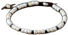 Adjustable White Bracelet With Natural Stones, Adjustable White Jewelry With Black Beads, Adjustable White Hand Wrapped Beaded Bracelets, Elegant White Bracelets With Black Beads, Casual White Bracelets With Natural Stones, Casual White Bracelet With Natural Stones, Elegant White Bracelet With Black Beads, White Spiritual Jewelry With Black Beads, Spiritual White Bracelet With Black Beads