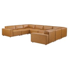 a brown leather sectional sofa sitting on top of a white floor