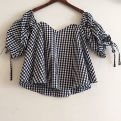 - Black/White Gingham - Sweetheart Neckline - 3/4 Ruched Sleeves - Adjustable Cuff Ties - Built In Zip Back Inner Bra With Boning And Rubber Gripping - Shell: 100% Cotton; Lining: 100% Rayon - Hand Wash Cold - Size S (Measurements Lying Flat, Please See Pictures For Measurement)(2nd And 3rd Photos Are Stock, Only Shows Look, Listing In Different Colors) - New With Tag Chic Plaid Blouse For Picnic, Chic Gingham Blouse For Summer, Chic Gingham Blouse For Brunch, Trendy Gingham Tops For Brunch, Chic Short Sleeve Tops For Picnic, Plaid Blouse For Brunch, Chic Gingham Short Sleeve Top, Plaid Cotton Blouse For Brunch, Gingham Short Sleeve Top For Brunch