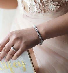 boho bracelets, tennis bracelet, silver bracelets, bridal jewelry, wedding jewelry ► Spend $200 | Receive 10% OFF Your Order with Code: 10OFF200 ► Please note in your order when your wedding date is For an elegant and classic look, this classic tennis bracelet paired with a Round and Tear Drop CZ bracelet is the perfect combo bracelet set. Each stone has a bezel setting, so it will not snag on fabrics. This bracelet has the perfect combination, dainty but still has enough crystal to keep it shin Silver Wedding Bracelet, Gold Bracelet Wedding, Boho Wedding Earrings, Eternity Bracelet, Silver Head Piece, Bracelet Tennis, Cz Bracelet, Back Necklace, Wedding Jewelry Bracelets