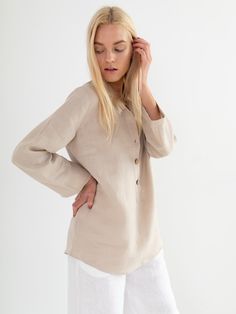 "LARA is a tunic style linen pullover shirt with long sleeves. DETAILS - Tunic style design - Long Sleeves - Collared - 100% midweight European linen fabric - Cut and sewn to order just for you in our studio COLOR - Beige, you can also choose other colors above - Fabric samples are available here https://www.etsy.com/listing/586569696/linen-fabric-samples SIZING & FIT - Length (shoulder to hem) is approximately 28 inches / 71 cm - Bust (pit to pit) is approximately 19 inches / 48 cm - Waist Neutral Long Sleeve Shirt For Spring, Beige Long Sleeve Linen Shirt, Neutral Long Sleeve Shirt With Buttons, Neutral Relaxed Fit Long Sleeve Blouse, Neutral Long Sleeve Shirt For Fall, Long Sleeve Linen Tops For Daywear, Neutral Long Sleeve Blouse With Buttons, Neutral Linen Button-up Top, Flax Blouse For Spring Workwear