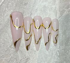 Hand painted fake nails. Includes: 10 reusable nails, nail glue, nail file and a cuticle pusher. Shape of nails is picture: XXL stiletto Shape Of Nails, Lines Nails, Triangle Nails, Nail Signs, Lines On Nails, Star Nails, Cuticle Pusher, Clear Nails, Heart Nails