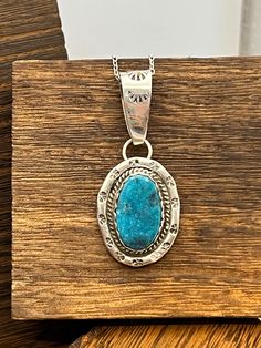 Main Stone:  Candelaria Turquoise Metal:  Sterling Silver Style:  Pendant Pendant Size: 3/4" x 1" Key Features: Turquoise pendant This beautiful turquoise pendant will be an exceptional addition to anyones jewelry collection!!  The stone is complimented by the gorgeous southwestern designed sterling silver and would be a great gift to that special someone, or treat yourself to it! Created in:  Manassa, Colorado Care instructions:   To prolong the life of your jewelry do not submerse in water, ap Artisan Blue Turquoise Necklace Untreated, Handmade Turquoise Round Necklace, One Of A Kind Oval Turquoise Necklace, Artisan Oval Turquoise Blue Necklace, Artisan Blue Oval Turquoise Necklace, Southwestern Untreated Turquoise Necklace, Southwestern Oval Turquoise Necklace, Untreated Southwestern Turquoise Necklace, Untreated Oval Blue Turquoise Necklace