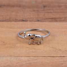 Cute Elephant Ring, Solid 925 Sterling Silver Elephant ring, Dainty Elephant Rings, fashion Animal Ring, Wedding/Engagement/Birthday Gifts Dimension :- JEWELRY CATEGORY:- HANDMADE RING METAL: - STERLING SILVER RING SIZE:- ALL SIZES AVAILABLE PURTY:- 925  Shipping:- All the parcels will be shipped with in 1-2 days of purchase... Payment:- We accept payment through PAYPAL only.... I make every effort to picture each item as realistic as I can but colors can be slightly different due to screen cali Elephant Rings Silver, Nickel-free Fine Jewelry Rings For Anniversary, Anniversary Nickel-free Fine Jewelry Rings, Fine Jewelry Nickel-free Promise Ring, Nickel Free Fine Jewelry Promise Ring, Elegant Silver Rings For Birthday, White Gold Nickel-free Rings For Promise, Silver Stackable Rings As Gift, Silver Stackable Rings Gift