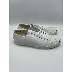 Introducing The Converse Jack Purcell Low Cut Sneakers In White Patent Leather. These Sneakers Are Perfect For Any Occasion, Whether You're Looking To Dress Up Or Down. The Leather Upper Material And Perforated Design Add A Touch Of Elegance To These Versatile Shoes. With A Us Shoe Size Of 9 And Eu Shoe Size Of 50, These Sneakers Are Suitable For Men Who Value Comfort And Style. The Low Top Shoe Shaft Style And Sneaker Type Make Them Perfect For Any Athletic Activity. Made In Japan, These Sneake Everyday White Canvas Sneakers, Classic White Leather Canvas Shoes, White Leather Sporty Canvas Shoes, White Sporty Leather Canvas Shoes, White Canvas Shoes With Rubber Sole For Everyday, White Sporty Canvas Shoes With Perforated Toe Box, Sporty White Canvas Shoes With Perforated Toe Box, Classic White Canvas Shoes For Sports, Converse Low-top Sneakers With Rubber Waffle Outsoles