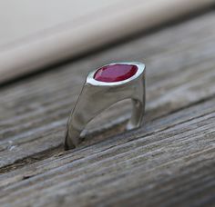 "❤️️ VALENTINE'S DAY SALE: ♥️25%OFF ON ALL HEART JEWELRY. ♥️15% OFF ON ALL OTHER SHOP JEWELRY An amazing ring inlaid with a marquise Ruby stone, with an impressive presence. A ring designed in smooth and modern lines, giving a feeling of warmth and meaning to the person wearing it. Impressive, prominent ring. Perfect for July birthstone gifts. Product Details: --------------------- Ring Size and material: Please select from the drop-down menu. Stone Type: Labradorite Settings:0.067*0.275\"/17*7m Ruby Jewelry With Marquise Cut For Gifts, Gift Marquise Cut Ring With Bezel Setting, Marquise Cut Bezel Set Ring For Gift, Marquise Cut Ring With Bezel Setting As Gift, Modern Marquise Cut Gemstone Jewelry, Marquise Cut Bezel Setting Jewelry Gift, Modern Marquise Cut Jewelry For Gifts, Silver Marquise Ruby Ring, Unique Marquise Gemstone Rings