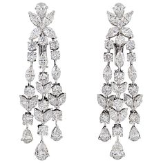 A fabulous pair of diamond chandelier earrings. 12.36 carats of high quality F/G color VS clarity diamonds set in 18k white gold. The same earrings can be found in the highest jewelry houses for 5x the price. Approximately 2.20 inches in length A must add to any collection!! Pear Diamond Earrings, Homecoming Outfit, Diamond Chandelier Earrings, Diamond Chandelier, Bridal Earring, Gold Chandelier Earrings, Sapphire And Diamond Earrings, Wedding Types, Woman Accessories