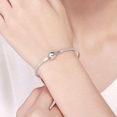 This sterling silver bangle bracelet for charms boasts a snake chain texture and is crafted from solid 925 sterling silver with platinum plating. While it takes the form of a bangle, its soft and flexible design ensures maximum comfort when worn. Personalize with adorable charms to tell your unique story or give as a gift to your beloved. The lock is adorned with the heartfelt words "Love Forever". Bracelet length is 17 cm ~ 6.69 inches19 cm ~ 7.48 inches21 cm ~ 8.27 inches Jewelry Care: See mor Forever Bracelet, Sterling Silver Bangle Bracelets, Jewelry Bracelets Silver, Love Forever, For Your Love, Cute Charms, Sterling Silver Bangles, Sterling Silver Bracelet, Snake Chain