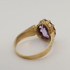 Estate 14k yellow gold large amethyst ring size 4.5. a 11mm by 10mm amethyst stone. great shape. no chips or damage. 2.8 grams. good size cocktail ring. Collectible Yellow Gold Oval Rings, Oval Yellow Gold Rings, Antique 14k Gold Amethyst Ring, Formal Yellow Gold Amethyst Ring With Bezel Setting, Formal 14k Gold Amethyst Ring, Hallmarked Yellow Gold Sapphire Ring, Yellow Gold Hallmarked Sapphire Ring, Yellow Gold Sapphire Ring Hallmarked Fine Jewelry, Collectible Gold Ruby Ring With Birthstone