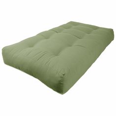 a green futon mattress on a white background