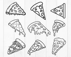 a bunch of different kinds of pizza on a wooden surface