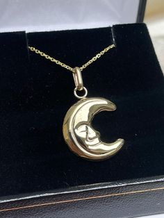 Enhance your jewelry collection with this exquisite Italian Moon necklace, crafted by Simonian® Jewelry. The yellow gold necklace is 28 inches long and features a hollow charm pendant in the shape of a moon with a content smile. The pendant is made of Solid 14K Gold and comes with a Certificate Guarantee. The necklace is perfect for anyone who loves fine jewelry and wants to add a touch of elegance to their look. The charm does not have any stones, making it a versatile piece that can be worn wi Gold Crescent Jewelry For Formal Occasions, Celestial Half Moon Yellow Gold Jewelry, Heirloom Crescent Jewelry For Gifts, Heirloom Crescent Jewelry Gift, 14k Gold Crescent Celestial Necklace, Celestial Style 14k Gold Half Moon Jewelry, Yellow Gold Plated Moon Jewelry, Celestial Half Moon 14k Gold Jewelry, Gold Moon Shaped Jewelry For Formal Occasions