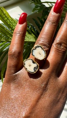 The Luciana geode ring effortlessly combines style and versatility. The striking design makes it an eye-catching statement piece, while its classic color palette ensures it can be worn with a wide variety of outfits! Size 8.5-9 Adjustable Agate Open Ring, Adjustable Agate Open Ring Jewelry, Nature-inspired Jewelry With Natural Stones In Open Ring, Nature-inspired Natural Stones Open Ring Jewelry, Nature-inspired Open Ring Jewelry With Natural Stones, Nature-inspired Open Ring With Natural Stones, Nature-inspired Natural Stone Open Ring Jewelry, Agate Open Ring Jewelry, Agate Gemstone Open Ring Jewelry