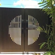 an image of a gate that looks like it is made out of wood and metal