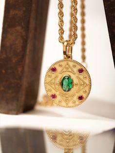 Welcome to PoshGoldJewelry, Our collection of byzantine necklaces are handmade in our goldsmith workshop in Greece. Each stone is set by hand by a certified setter, A unique style of pendant where the colors of the stones can be changed to your ideal combination, please message us for more details. Gemstones: Simulated Emerald, Simulated Ruby Pendant Size: 0.70 inches / 18mm (diameter) Pendant Thickness: 0.6mm Rope Chain Thickness: 2.10mm Material: - 14K Real Solid Gold A hallmark (stamp) of the Gold Byzantine Necklace With Round Pendant, Yellow Gold Byzantine Medallion Necklace, Gold Byzantine Pendant Necklace, Yellow Gold Byzantine Pendant Jewelry, Ancient Yellow Gold Medallion Necklace, Byzantine Necklace, Ruby Pendant, Greek Jewelry, Medallion Necklace