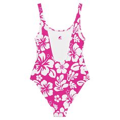 Live your best beach life in our White Hawaiian Flowers on Hot Pink One-Piece Swimsuit. With a beautiful floral print and flattering fit, this swimsuit is perfect for all shapes and sizes. The silky smooth material will have you feeling the Aloha love while you chill at the beach or pool. Now that's something to be Extremely Stoked about!• 82% Polyester, 18% Spandex• Chlorine-resistant fabric• Cheeky fit with a scoop neckline and a low scoop back• Zig-zag stitching• Double-layer front• Four-way Fitted Hawaiian Swimwear For Summer, Fitted Tropical Swimwear For Beach Season, Fitted Swimwear With Hibiscus Print For Vacation, Hawaiian Sleeveless Swimwear For Poolside, Floral Print Swimwear For Summer, Floral Print Swimwear For Summer Swimming, Hawaiian Style Swimwear For Surfing, Fitted Floral Print One Piece For Beach Party, Hawaiian Style Surfing Swimwear For Beach Season