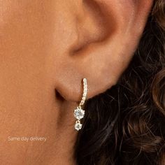 diamond huggie hoop earrings with charm*14k/10k solid gold hoops*tiny gold hoops with diamond Drop Dangle*diamond earrings*gift for her DESCRIPTION -------------------- This earring Made with 14k/10K solid gold Minimalist style with Diamond G-H Color, Si Purity and high-quality Moissanite (VVS clarity) (Colorless). * Earring Size: → Earring gauge: 20→ Inner Diameter: 8 mm → Outer diameter: 10 mm * Moissanite Details: → Shape: Round → Measurement: 4.OO mm + 2.50 + 1.30 mm → Number of Stone: 2 + 2 Hoop Earrings With Charm, Hoops With Charms, Diamond Huggie Earrings, Diamond Huggies, Minimal Earrings, Simple Diamonds, Diamond Dangle Earrings, Earrings Diamond, Gauged Earrings