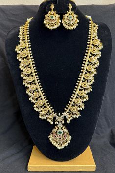 A gold plated peacock design Long Necklace Set with pearl droppings are a popular choice for women who want to wear a beautiful and meaningful piece of jewelry without spending a lot of money. Features: Peacock design long & short necklace Matching earrings Dangles Lightweight and elegant Can be paired with any dress, kurti, or saree Dimensions: Necklace length : 13 in & 8 inch Earring length : 2.2 in Material: Matte Gold Plated Brass CZ Stones Pink,Green, White Faux rice Pearls Closure: Hook Cl Dress Kurti, Long Necklace Set, Necklace With Pearl, Rice Pearls, Necklace Matching, Peacock Design, Hook Clasp, Short Necklace, Wedding Jewelry Sets