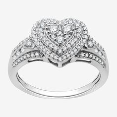 a heart shaped diamond ring with two rows of diamonds on the band, set in 18k white gold