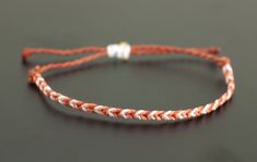 Burnt orange, coral and natural colored mini braided bracelet can be worn anywhere! Waterproof boho chic friendship bracelet can be worn to the pool, at the beach, working out or in the shower. Colorfast so won't fade when wet. Wear this adjustable bracelet alone or stacked with others for a fun layered look! Have different colors in mind? Convo me for a custom order! I'd be happy to make one just for you! B11 Bohemian Orange Braided Bracelets Gift, Orange Bohemian Braided Bracelet Gift, Adjustable Orange Braided Bracelet For Festivals, Adjustable Orange Bohemian Braided Bracelet, Bohemian Orange Hand-strung Bracelets, Surfer Bracelets, Fish Tail Braid, Cute Bracelets, Beach Jewelry