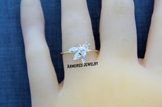 This listing is for a ring. This beautiful Honey Bee ring is completely handmade from start to finish in my private studio. © Armored Jewelry. All rights reserved. By purchasing from my shop, you agree to the Armored Jewelry policies: http://www.etsy.com/shop/ArmoredJewelry/policy?ref=shopinfo_policies_leftnav Handmade Adjustable Butterfly Ring For Wedding, Handmade Adjustable Butterfly Wedding Ring, Handmade Sterling Silver Butterfly Promise Ring, Unique Sterling Silver Butterfly Ring For Wedding, Sterling Silver Butterfly Ring For Wedding, Handmade Sterling Silver Butterfly Ring For Anniversary, Unique Sterling Silver Butterfly Promise Ring, Adjustable White Sterling Silver Butterfly Ring, Handmade Butterfly Ring For Wedding