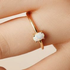 14K Solid Gold Opal Ring, October Birthstone Ring, Dainty Minimalist Stackable Ring, Oval Cut Gemstone, Best Gift for Her, Valentines Day - Etsy Adjustable Oval Opal Ring Minimalist Style, Minimalist Oval Cabochon Opal Ring For Anniversary, Minimalist Adjustable Oval Opal Ring, Minimalist Oval Opal Ring For Gift, Minimalist Oval Opal Ring Gift, Oval Stackable Fine Jewelry Rings For Everyday, Everyday Oval Stackable Fine Jewelry Rings, Oval Stackable Rings For Everyday Fine Jewelry, Oval Stackable Rings For Everyday