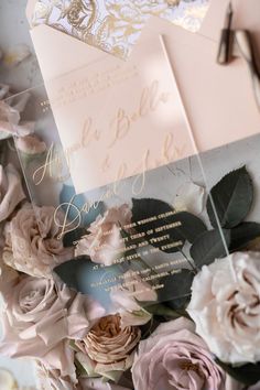 wedding stationery with pink roses and gold foil