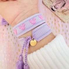 Lovely Purple Cotton Tassel Bracelet With Pink Embroidered Mouse Adjustable To Fit Sizes 6 Inches And Up Perfect Accessory For Your Next Disney Vacation This Is For One Bracelet Tags: Walt Disney World, Disneyland, Magic Kingdom, Aesthetic Disney Bracelet, Epcot, Animal Kingdom, Hollywood Studios, Cinderella Castle, Magic, Rapunzel, Mickey Mouse, Minnie Mouse, Disney Princess, Frozen, Anna And Elsa, Gift For Teen, Fireworks, Disney Resorts, Flower And Garden Festival, Ever After, Disney Springs, Cute Purple Friendship Bracelets, Adjustable Disney Style Bracelets, Playful Purple Friendship Bracelets Gift, Cute Adjustable Purple Friendship Bracelets, Playful Purple Friendship Bracelets As Gift, Cute Purple Friendship Bracelets As Gift, Cute Purple Friendship Bracelets For Gift, Cute Handmade Purple Friendship Bracelets, Magic Kingdom Aesthetic