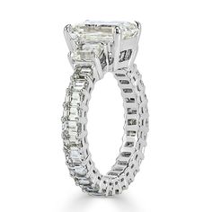 an emerald cut diamond ring with baguetts